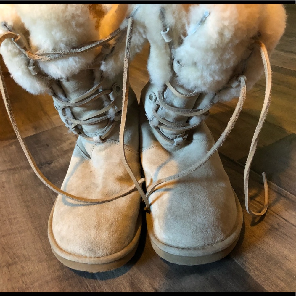 Beige uggs with fur trim .. barely worn.